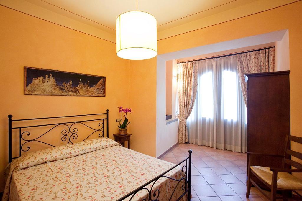 Residenza Palazzo Saloni Aparthotel Montalcino Quarto foto